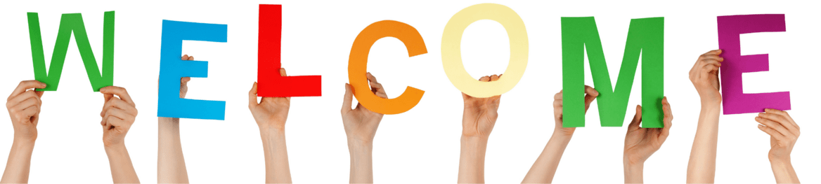 Colorful letters being held up spelling welcome